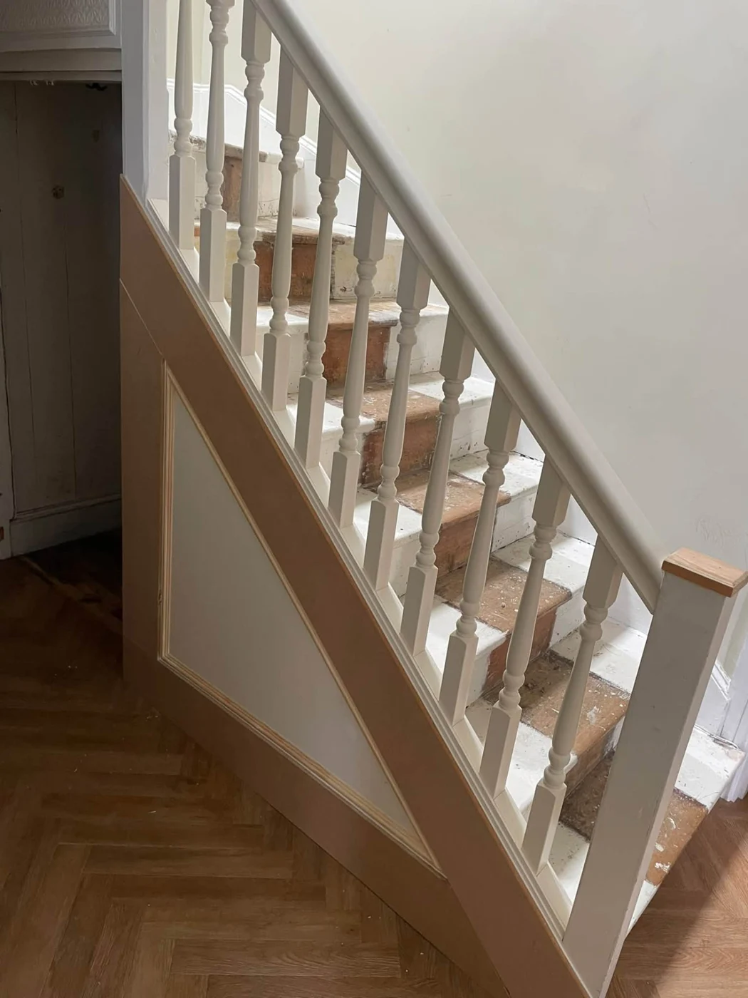 After: new turned spindles, timber newel and under-stairs decorative panelling